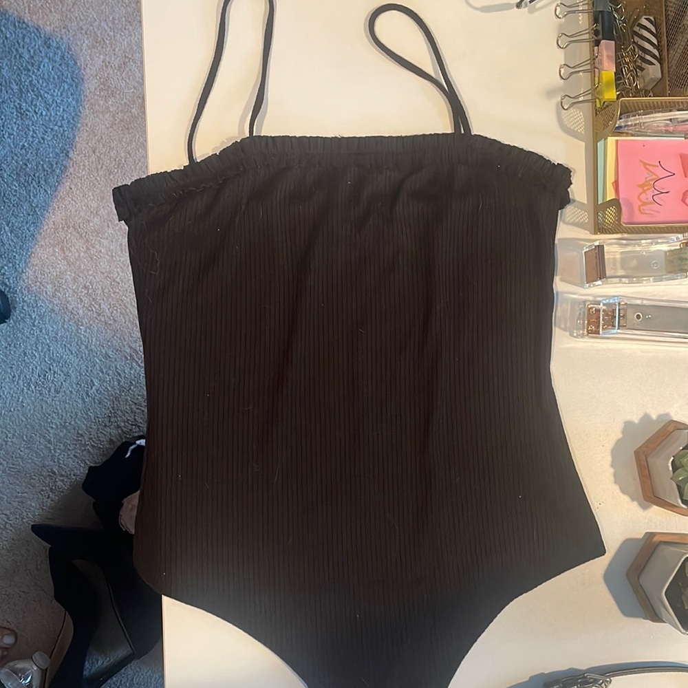 Black kittenish ruffle top bodysuit size large.